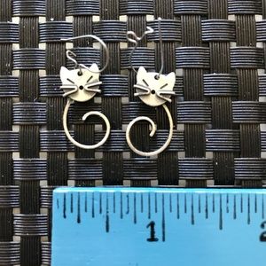 Silver cat-face earrings